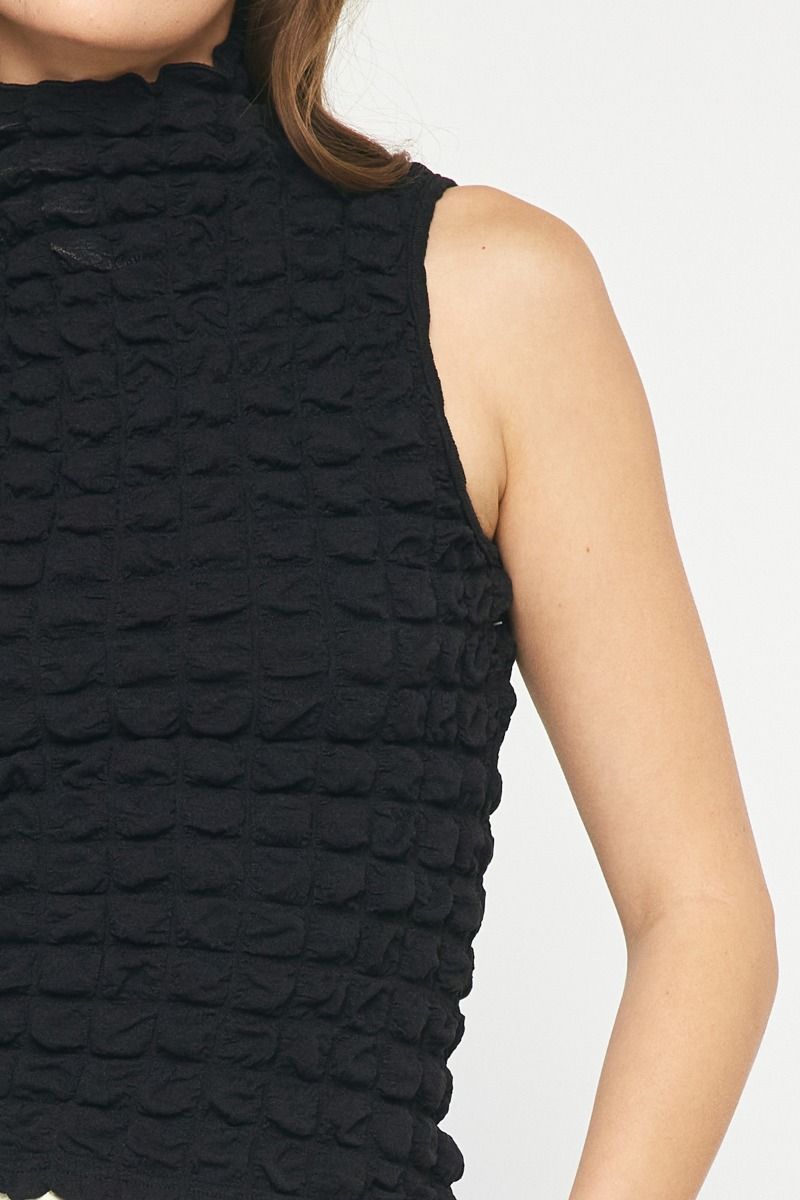 Textured sleeveless turtleneck top